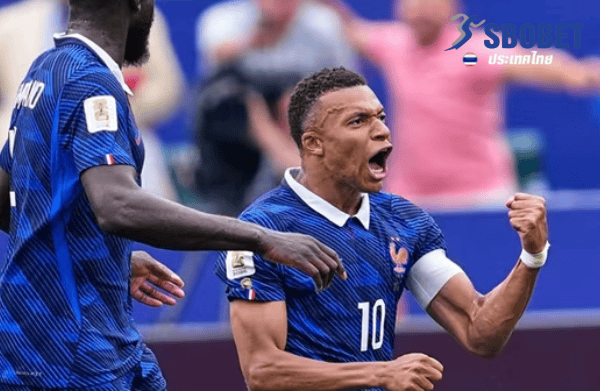 France weather the storm to beat Iraq and sail into last 32